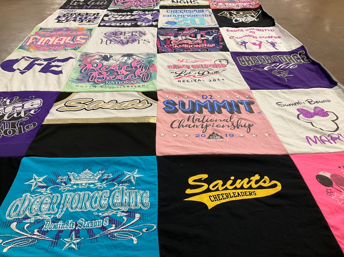 T-shirt quilt with cheerleading, dancing themes by Andrea from PA