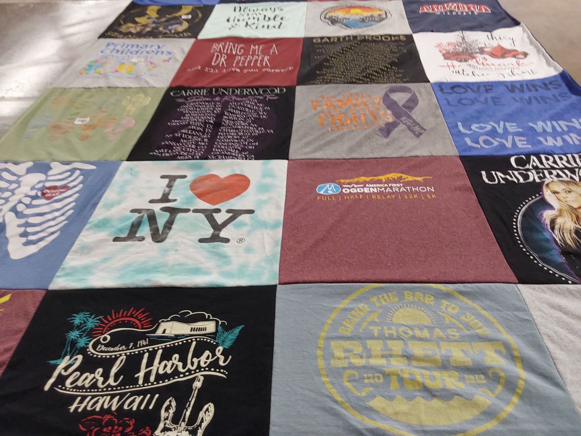 T-shirt quilt with music, concerts themes by Deanna from UT