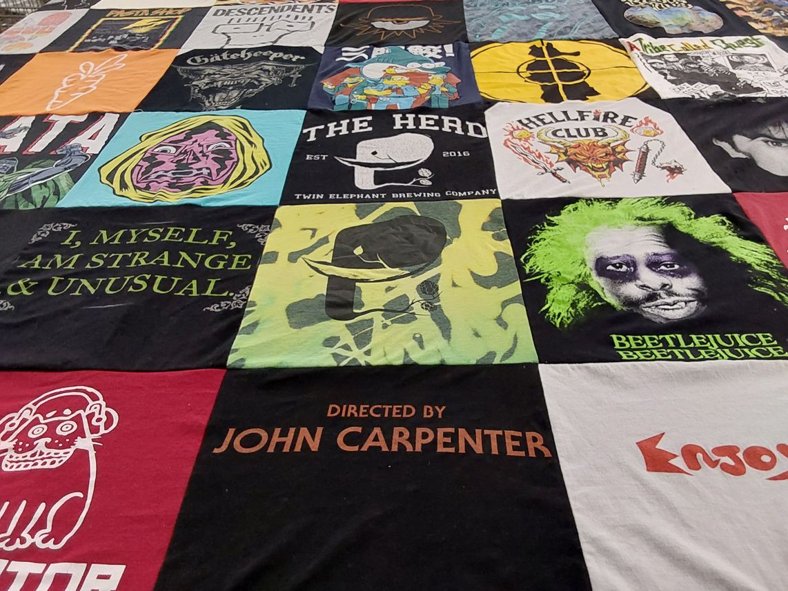 T-shirt quilt with music, film themes by Henry from NJ