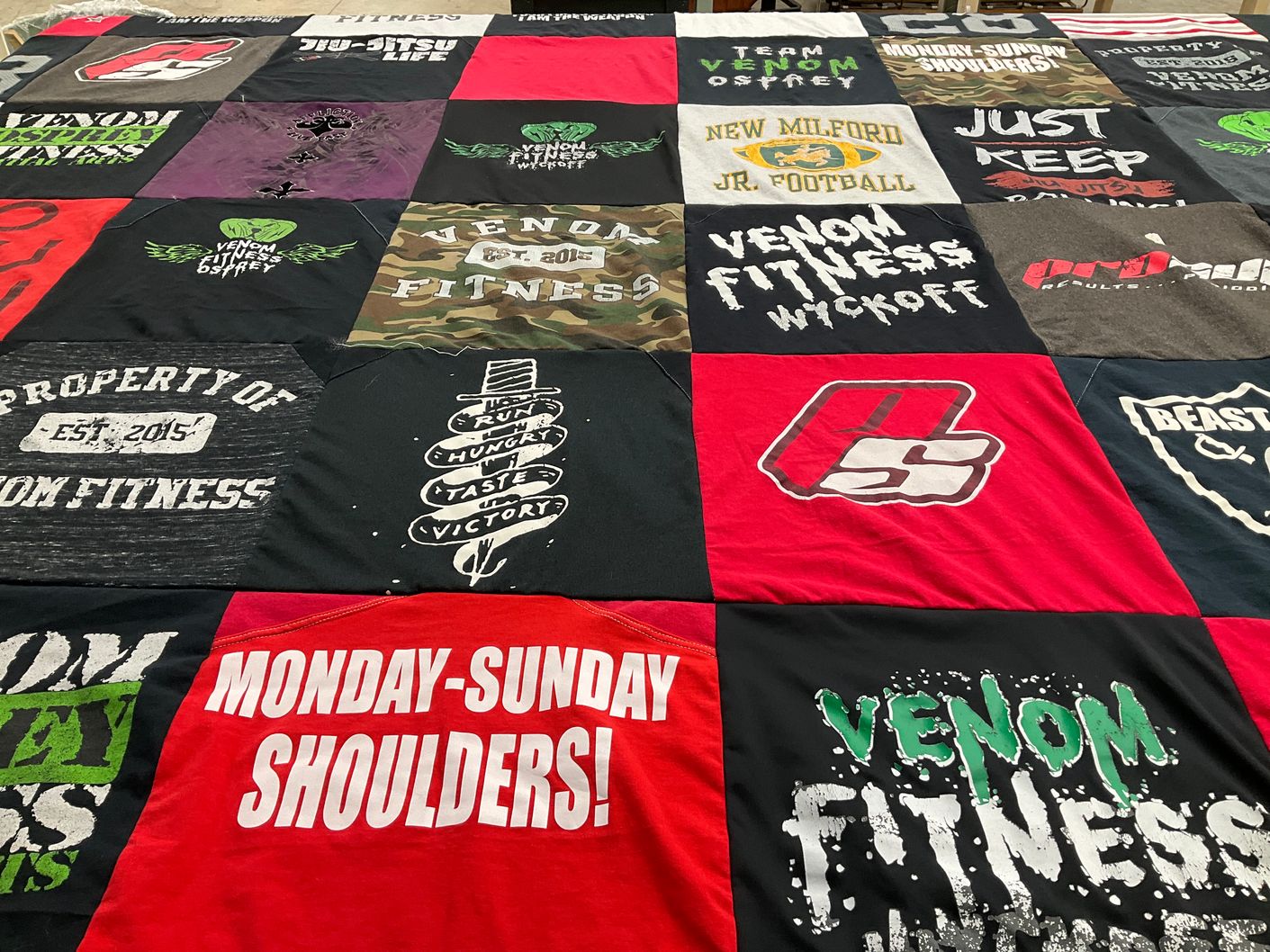 T-shirt quilt with fitness, sports themes by Debra from FL