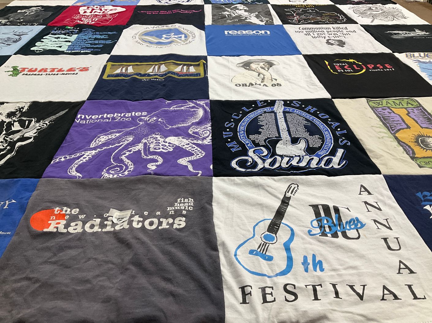 T-shirt quilt with music, zoology themes by Lynda from FL