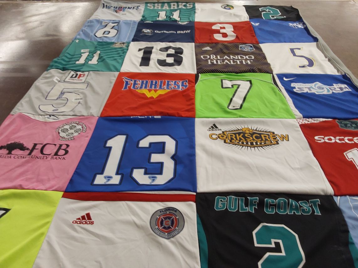 T-shirt quilt with soccer themes by Kari from FL