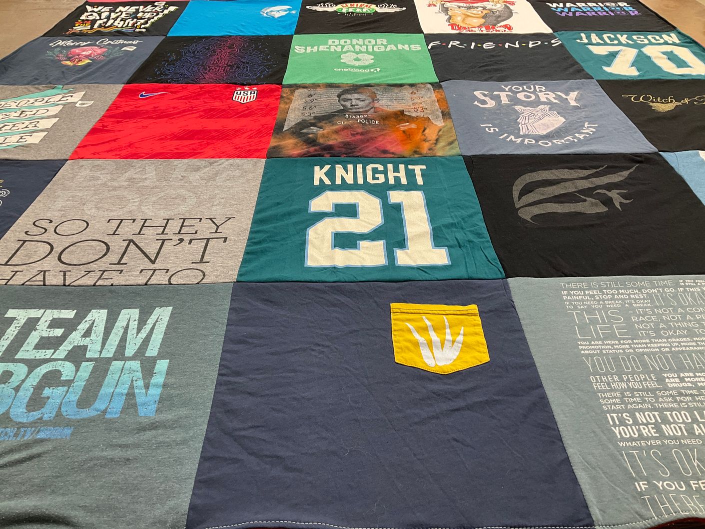 T-shirt quilt with sports, community themes by Brittany from WA