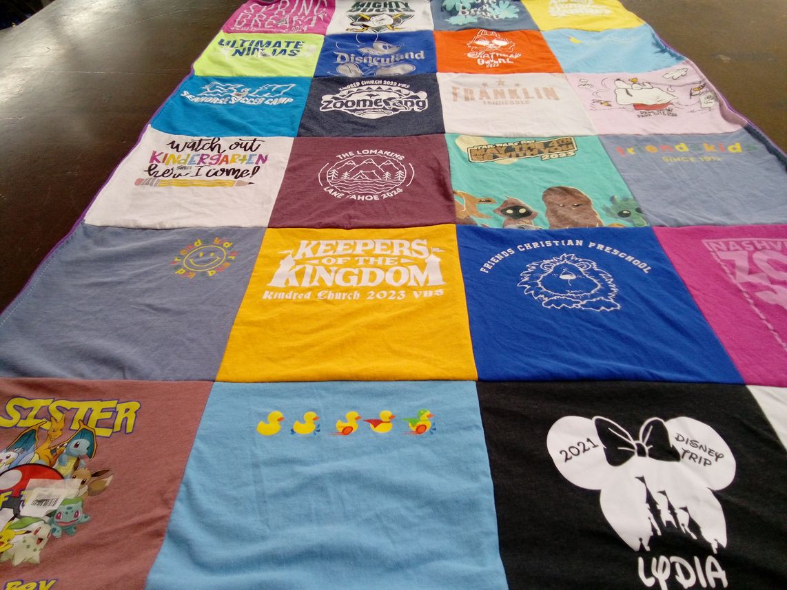 T-shirt quilt with children, education themes by Alissa from CA
