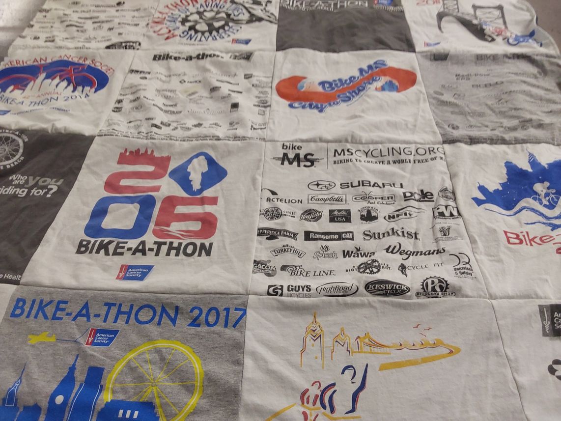 T-shirt quilt with cycling, charity events themes by Judy from PA
