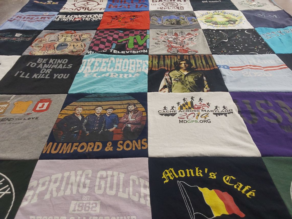 T-shirt quilt with music, animal advocacy themes by Christine from MD