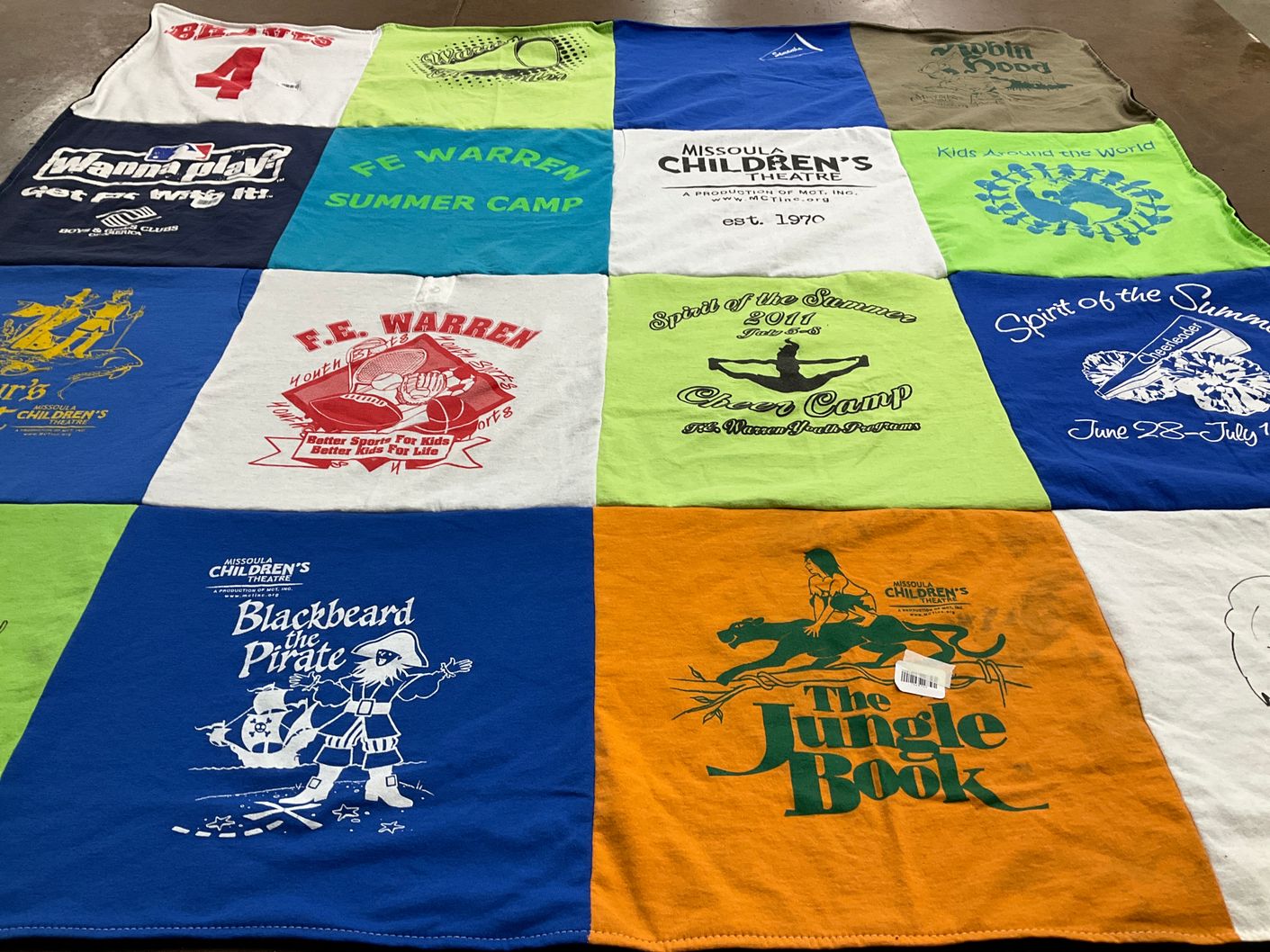 T-shirt quilt with children's activities, theatre themes by Amanda from WY