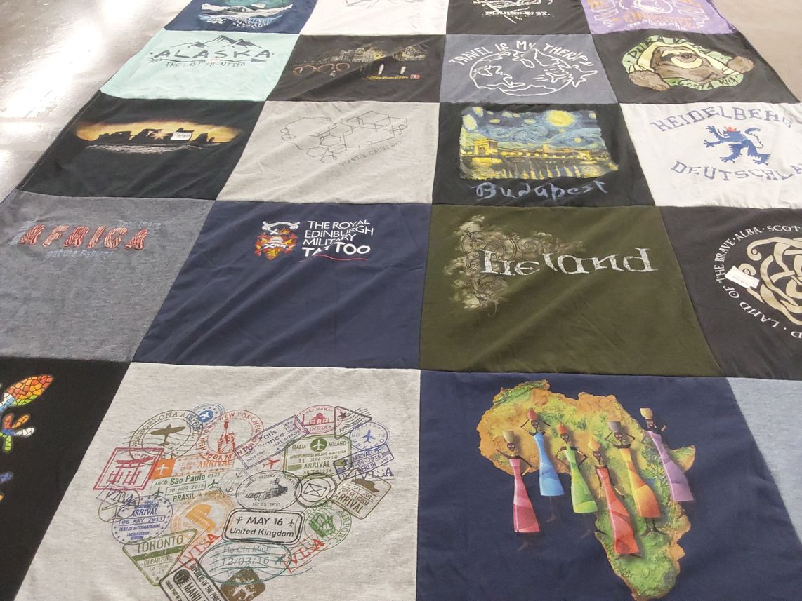 T-shirt quilt with travel themes by Lisa from SC