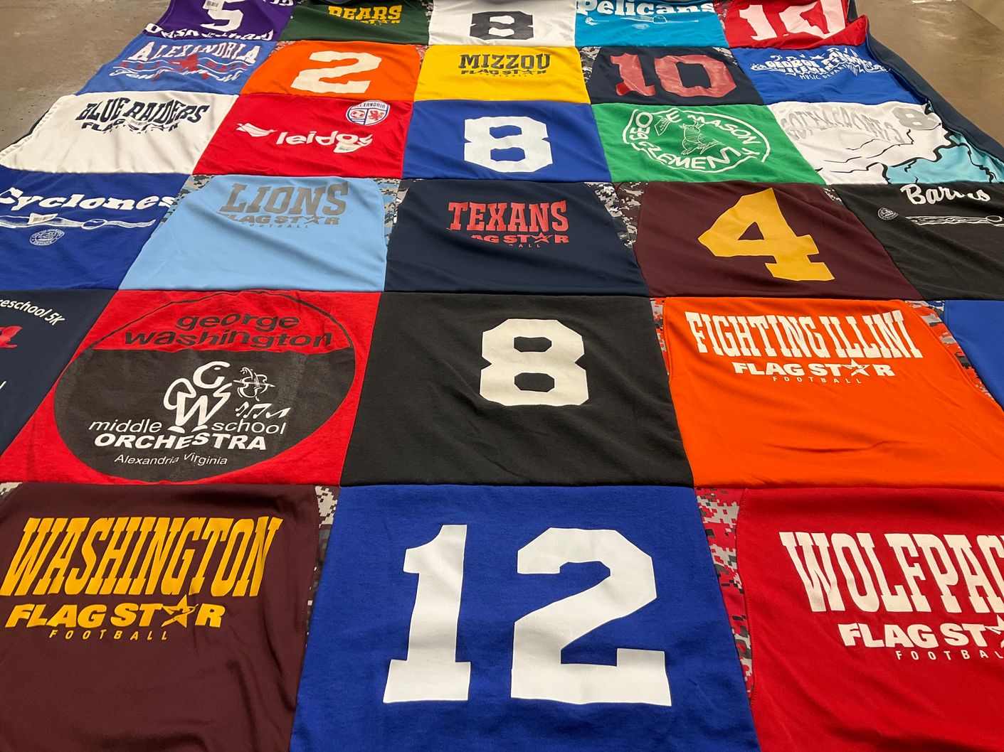 T-shirt quilt featuring fighting illini, washington flag star football by Jessica from VA