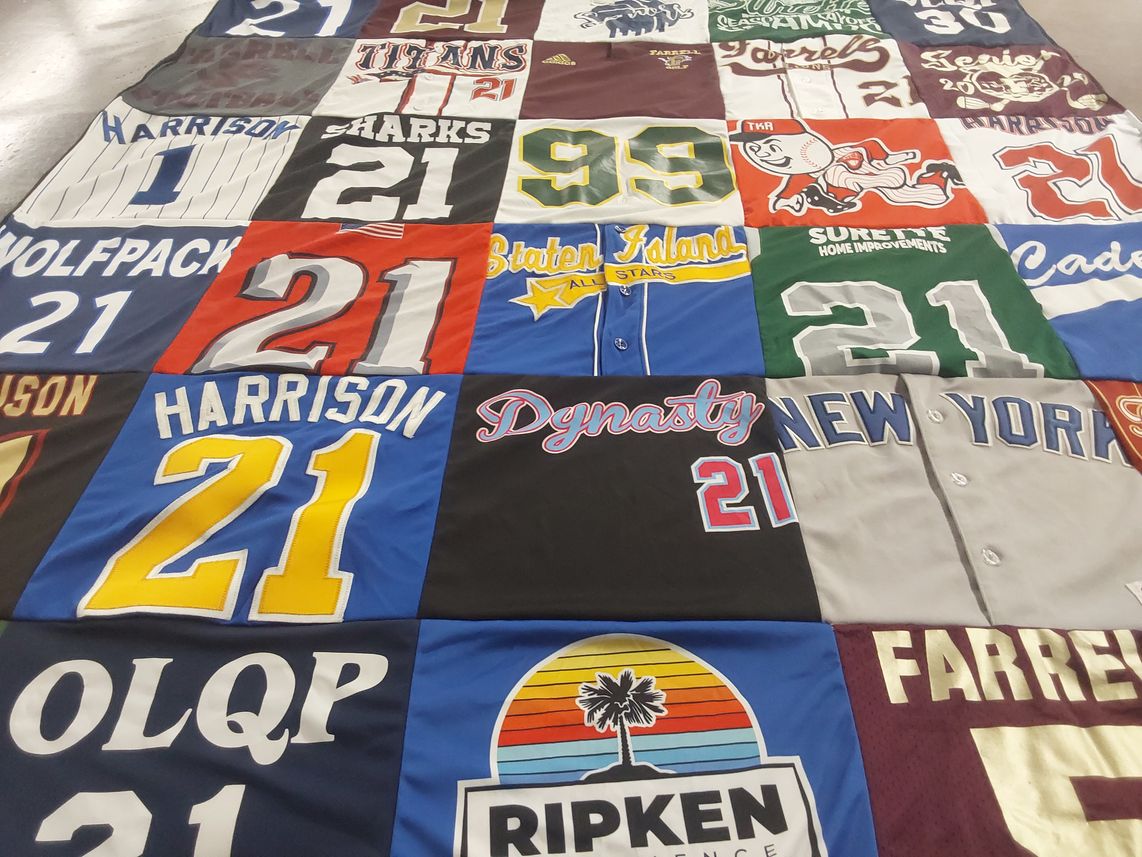T-shirt quilt featuring wolfpack, sharks by Michelle from NY
