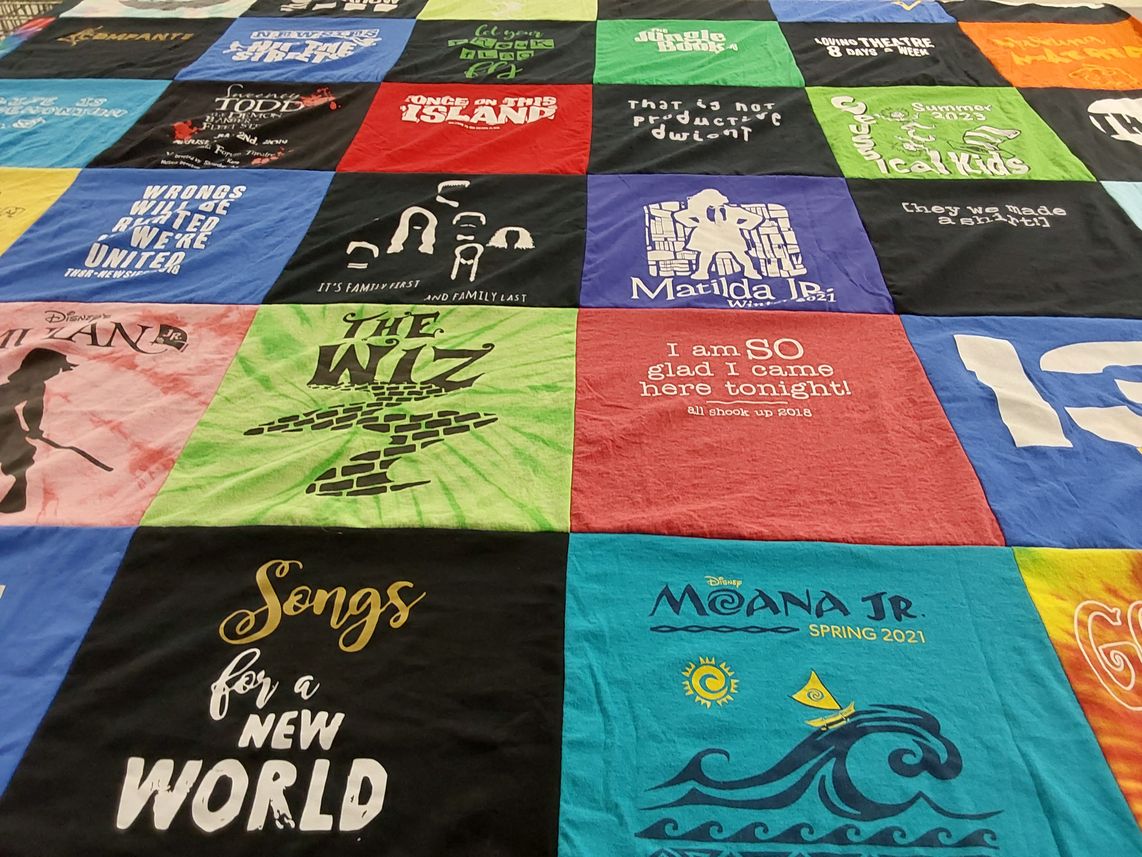 T-shirt quilt with theatre, musicals themes by Shannon from CA