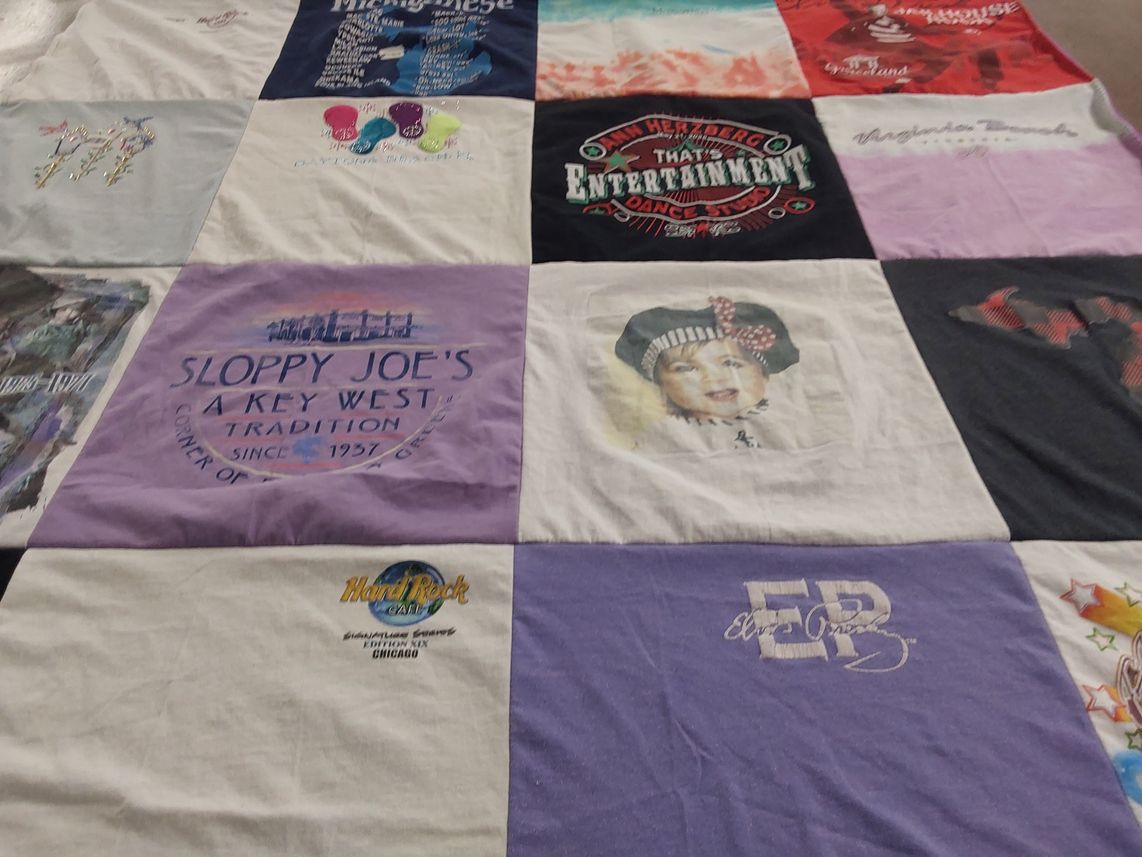 T-shirt quilt with food, music themes by Jan from MI