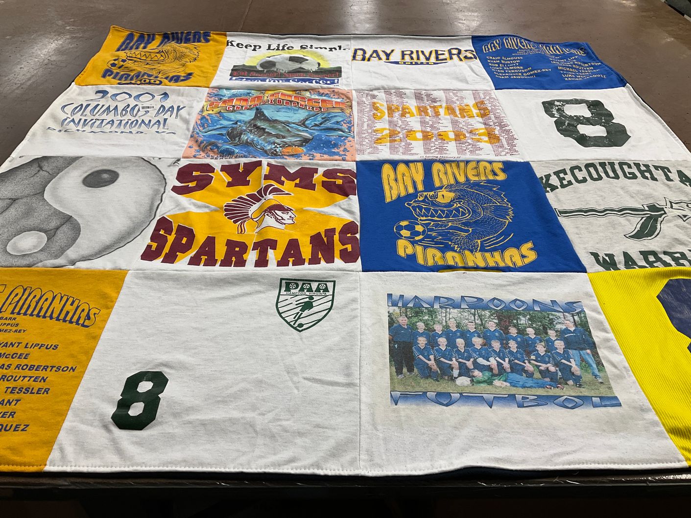 T-shirt quilt featuring bay rivers piranhas, symons spartans by Dolores from VA