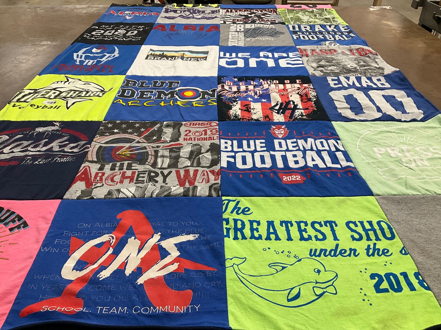 T-shirt quilt featuring blue demon football by Kelly from IA