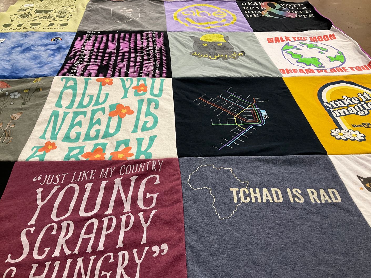 T-shirt quilt with reading, parenting themes by Kathryn from VA