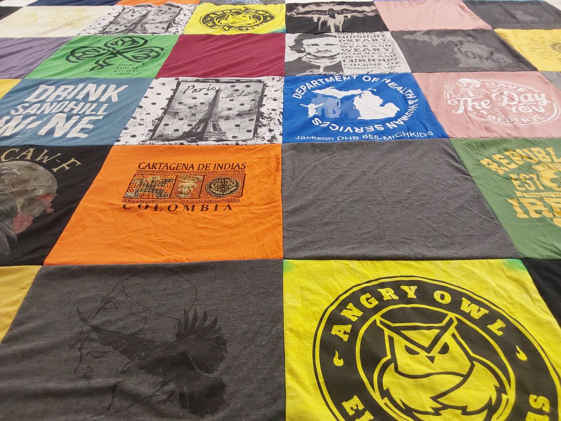 T-shirt quilt with travel, wine themes by Heidi from MI