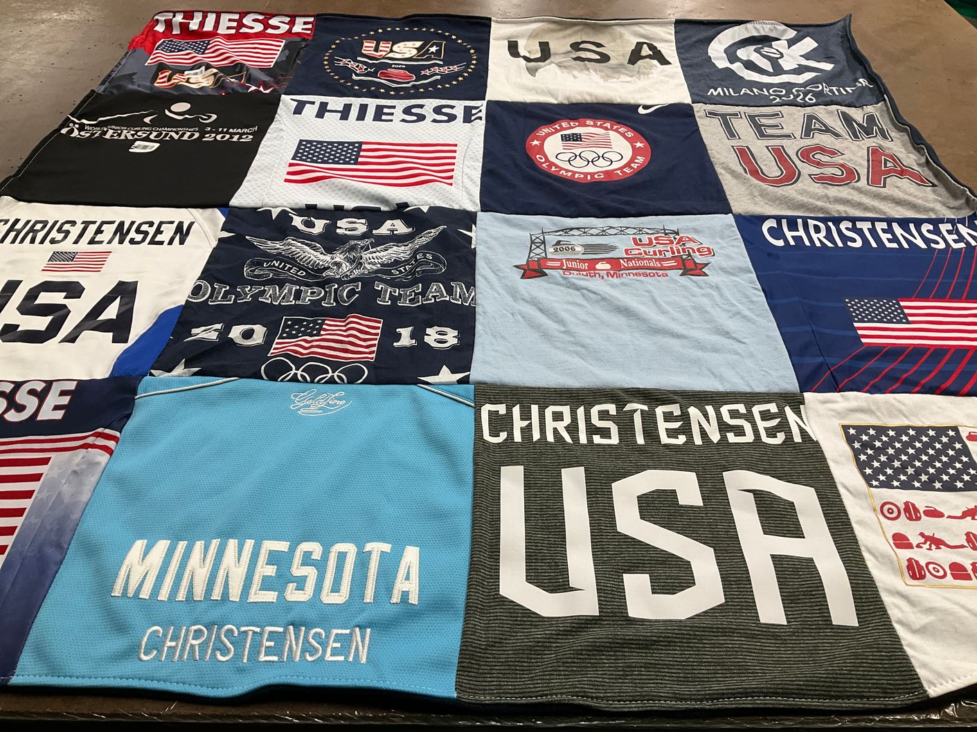 T-shirt quilt with olympics, curling themes by Cory from MN