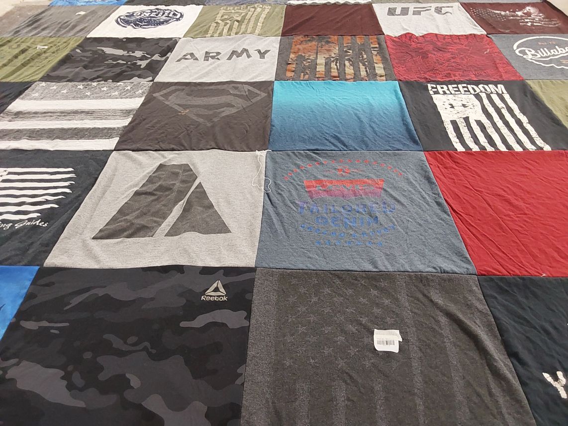 T-shirt quilt with military, fitness themes by Elyse from FL