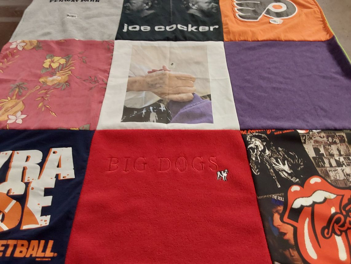 T-shirt quilt with music, sports themes by Joanne from NY