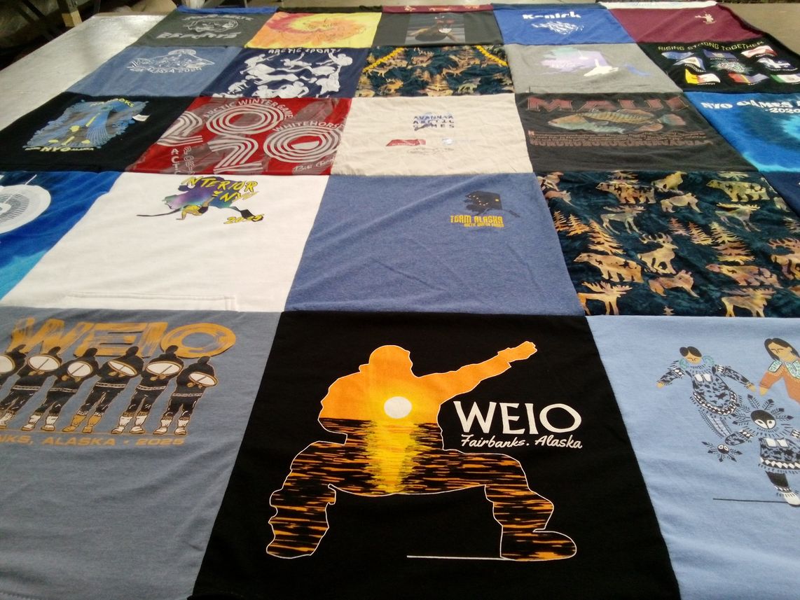 T-shirt quilt with hockey, winter sports themes by Theresa from AK