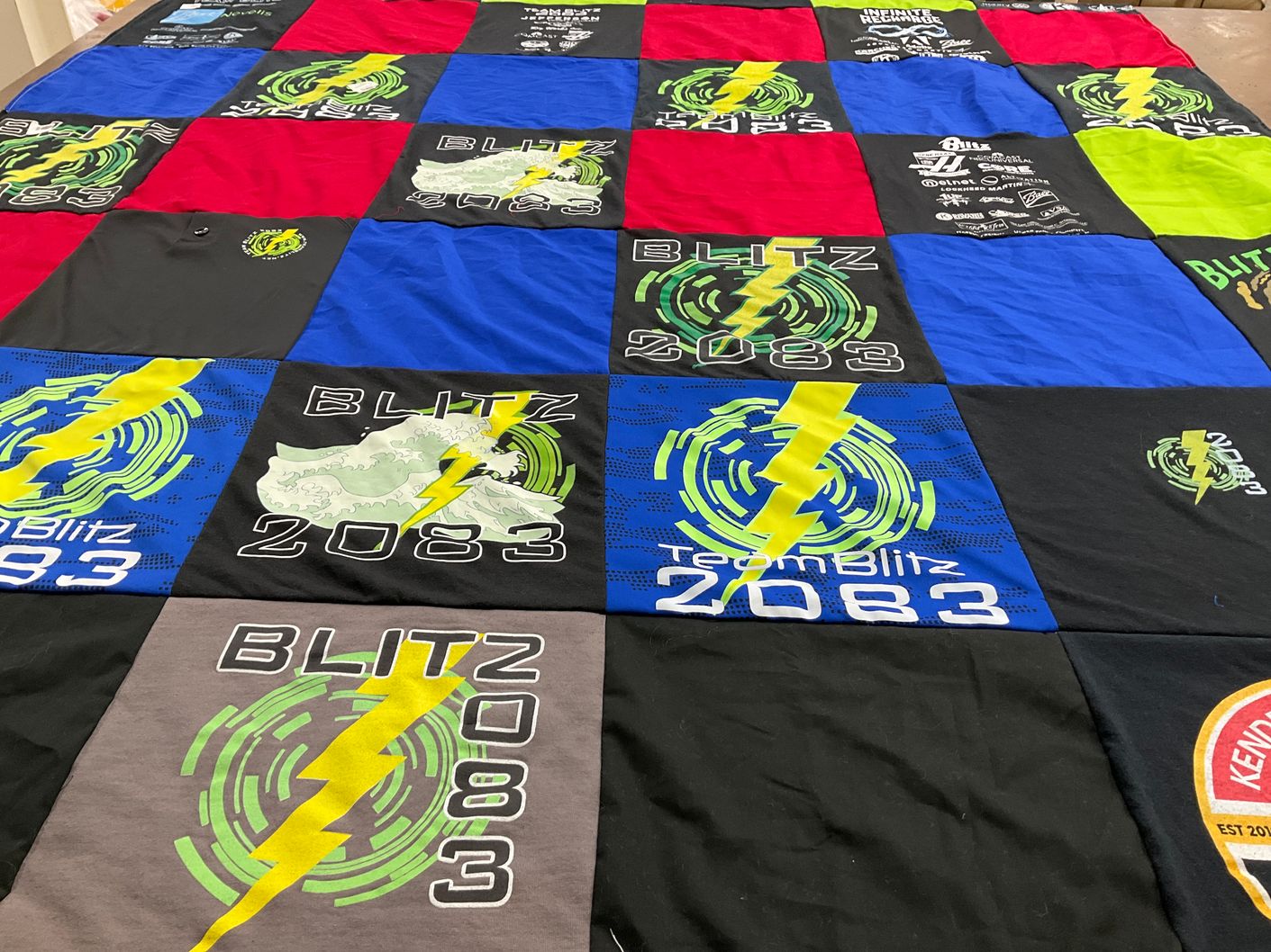 T-shirt quilt with robotics themes by Mindy from CO