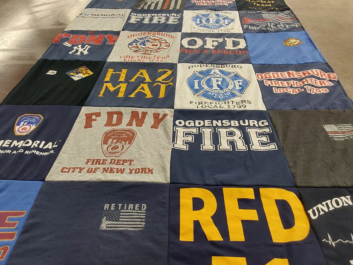 T-shirt quilt with firefighting, emergency services themes by Gerald from NY