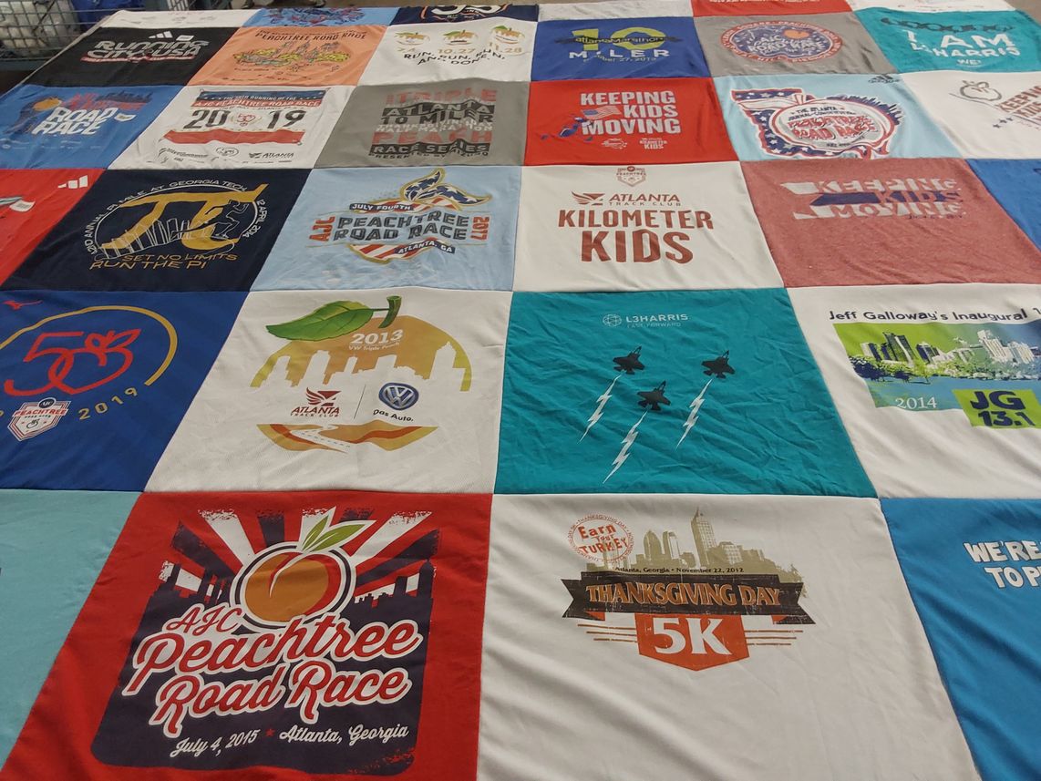 T-shirt quilt with running, events themes by Andy from GA