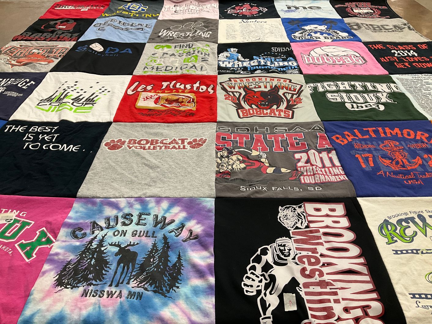 T-shirt quilt featuring brookings high school wrestling, bobcat volleyball by Austin from SD