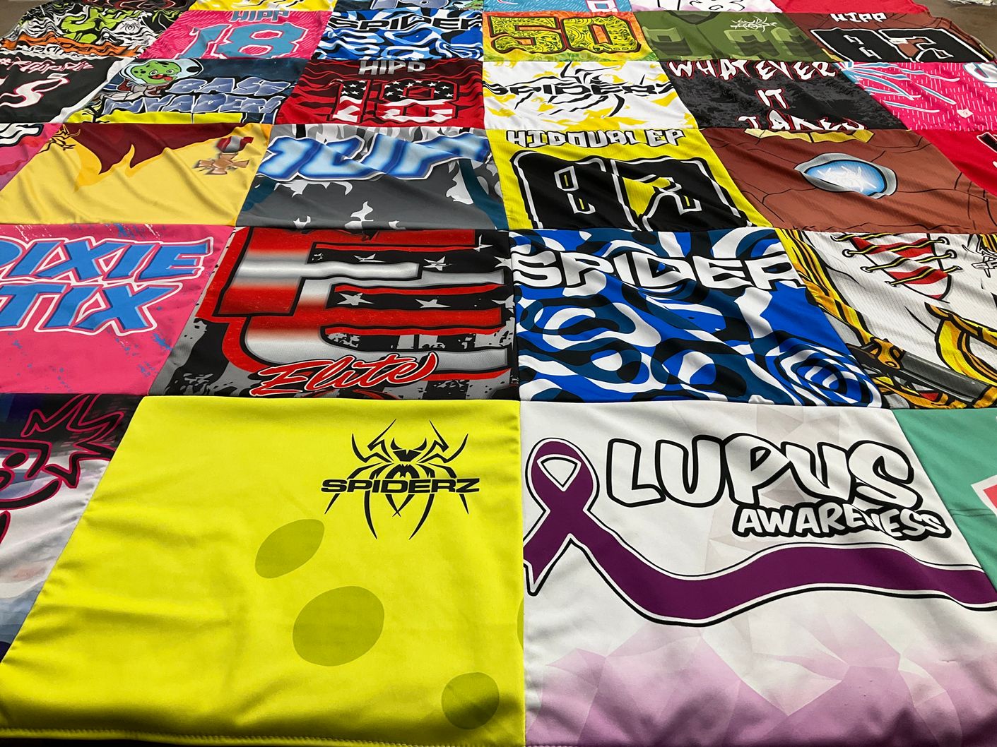 T-shirt quilt with awareness themes by Jodi from NV