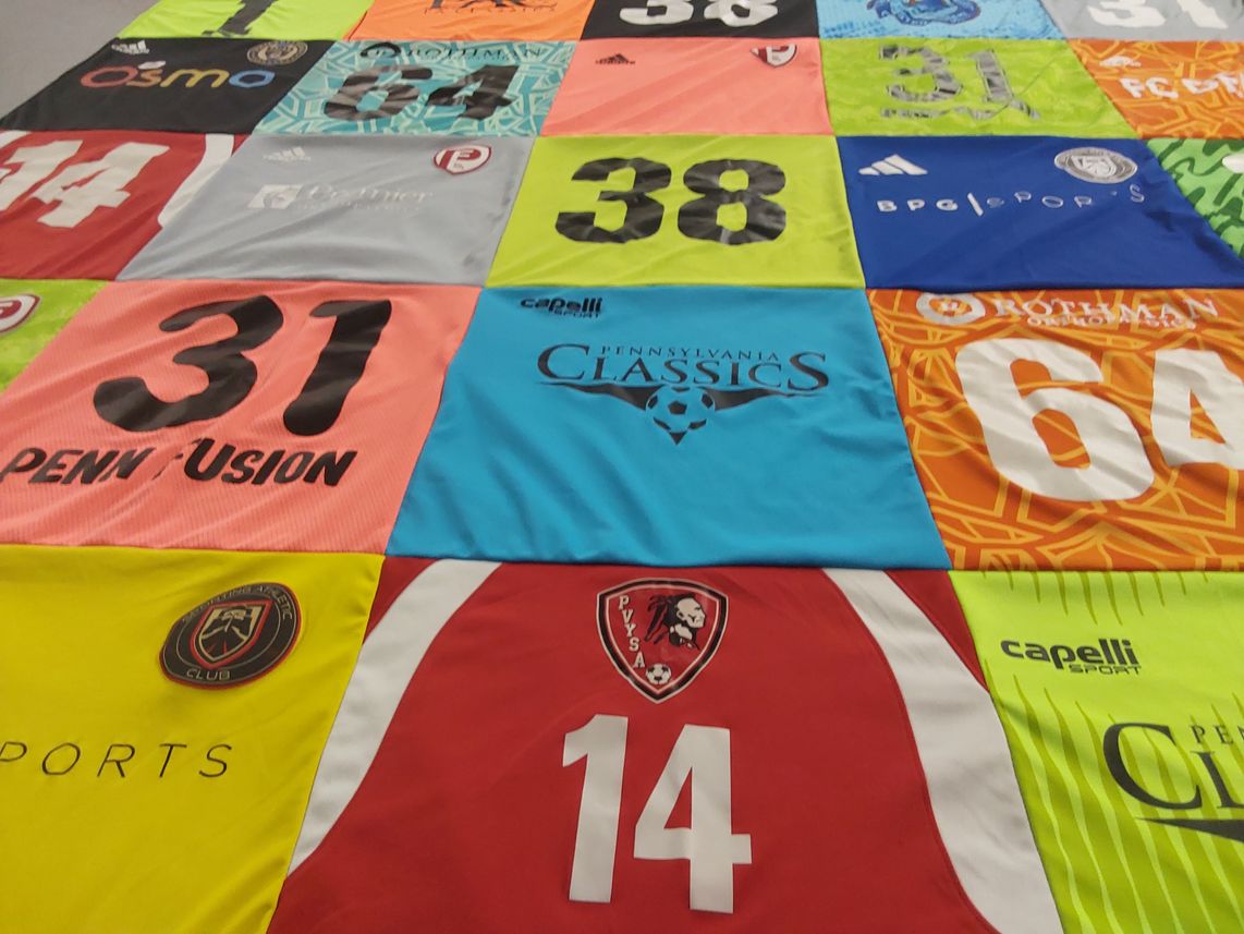 T-shirt quilt with soccer themes by Denise from PA