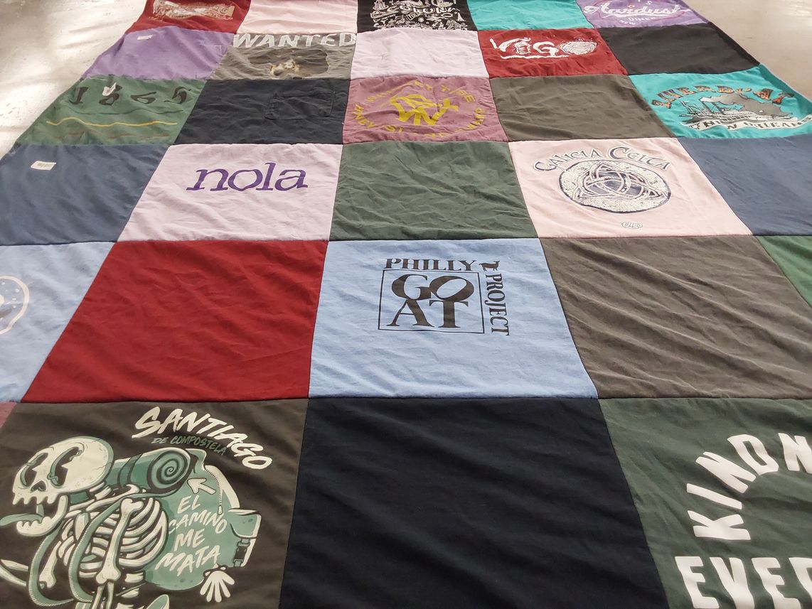 T-shirt quilt with travel, culture themes by Caron from PA