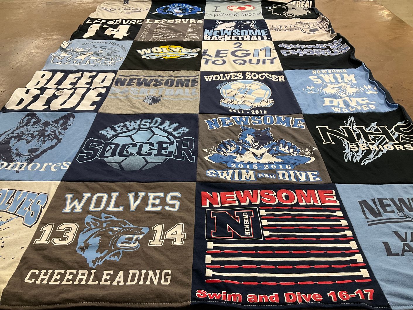 T-shirt quilt featuring newsome wolves soccer, newsome wolves swim and dive by Genevieve from FL