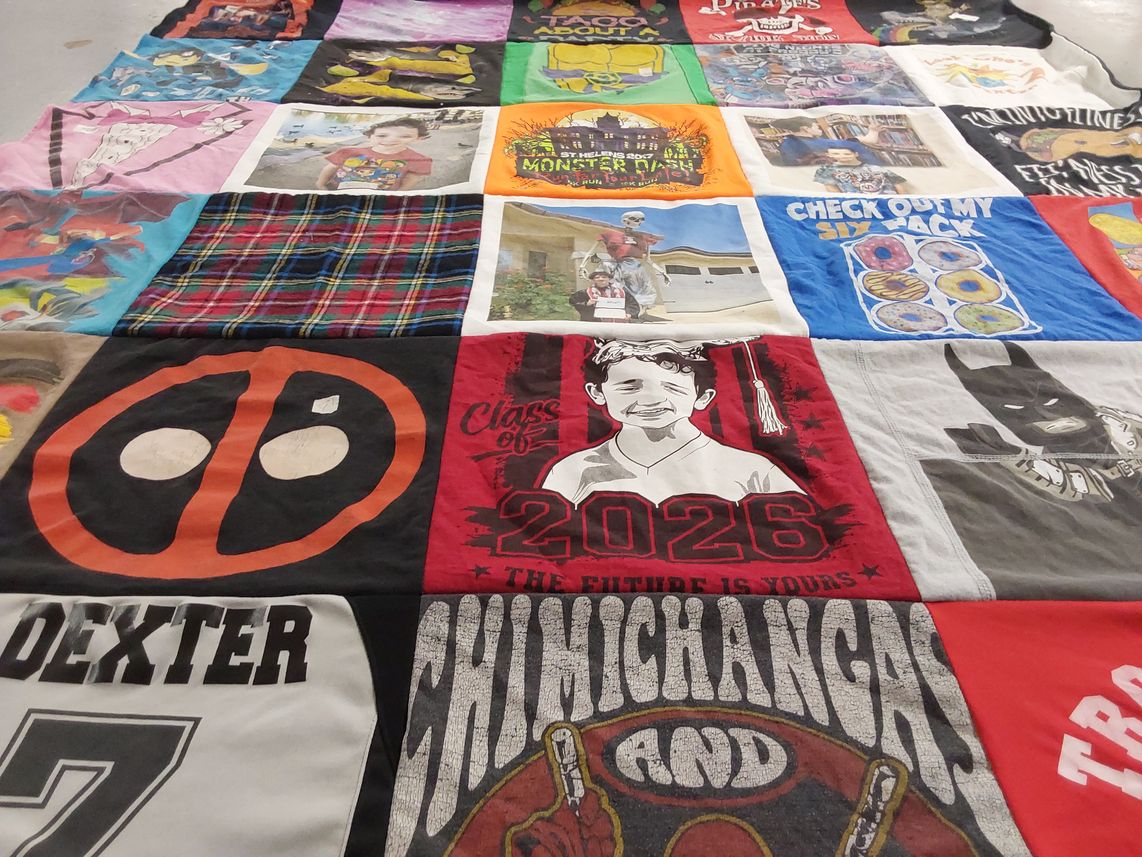T-shirt quilt with comic books, superheroes themes by Rena from NV