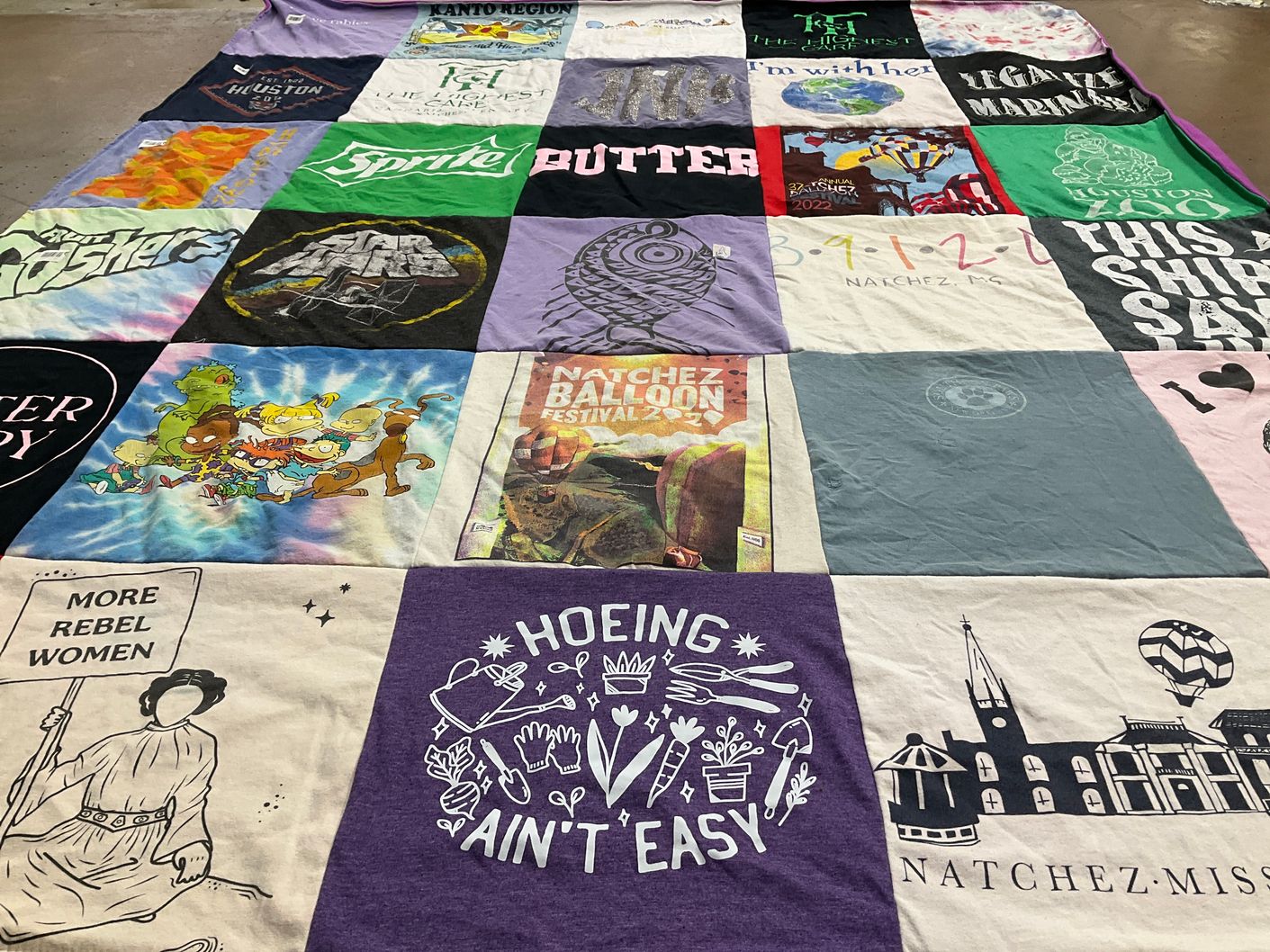 T-shirt quilt with festivals, activism themes by Jessa from MS