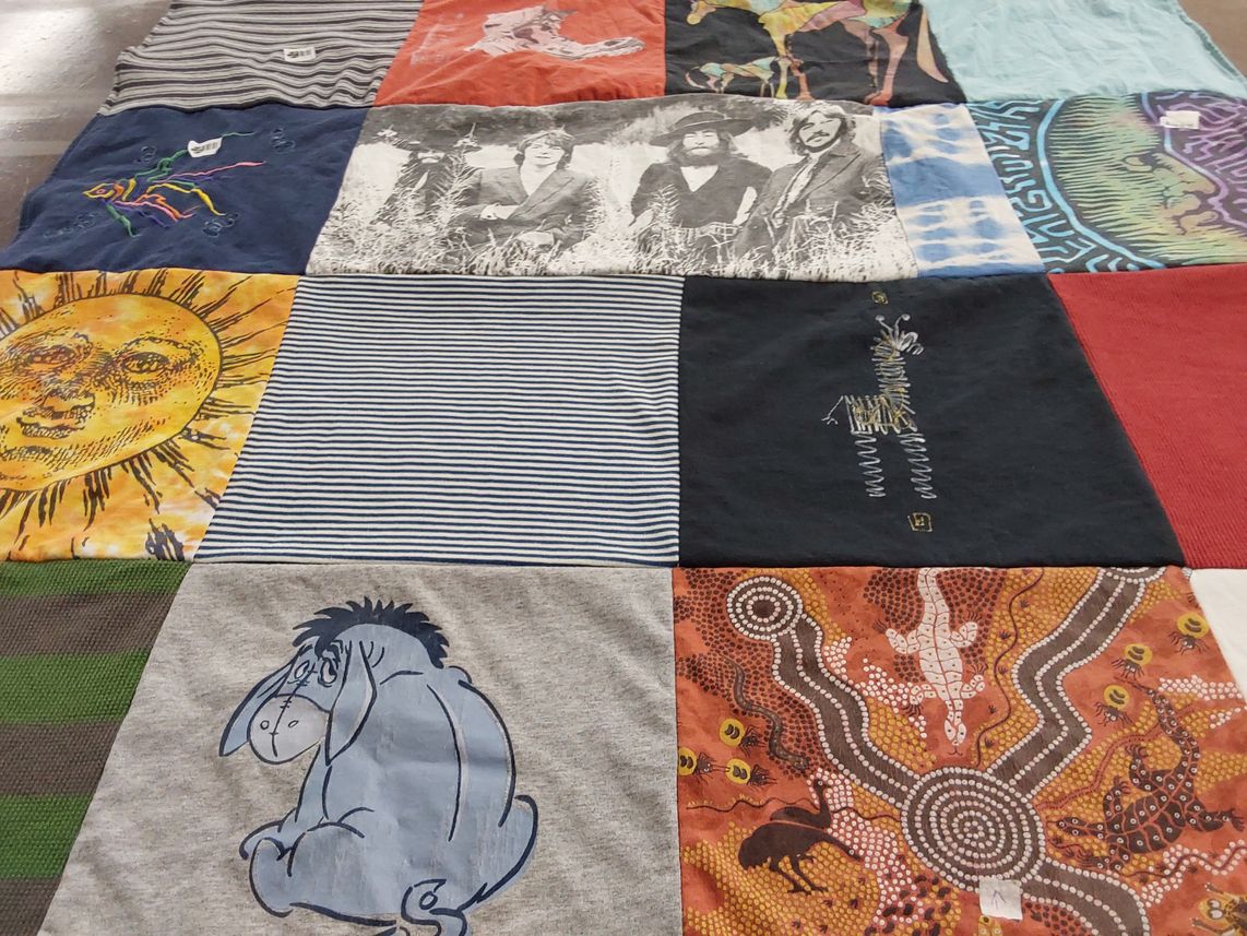T-shirt quilt with cartoons, music themes by matt from WA