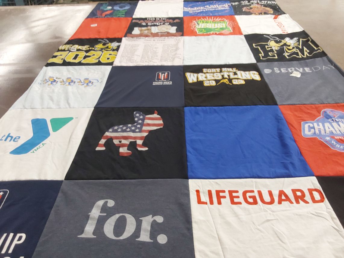 T-shirt quilt with sports, fitness themes by Wendi from SC