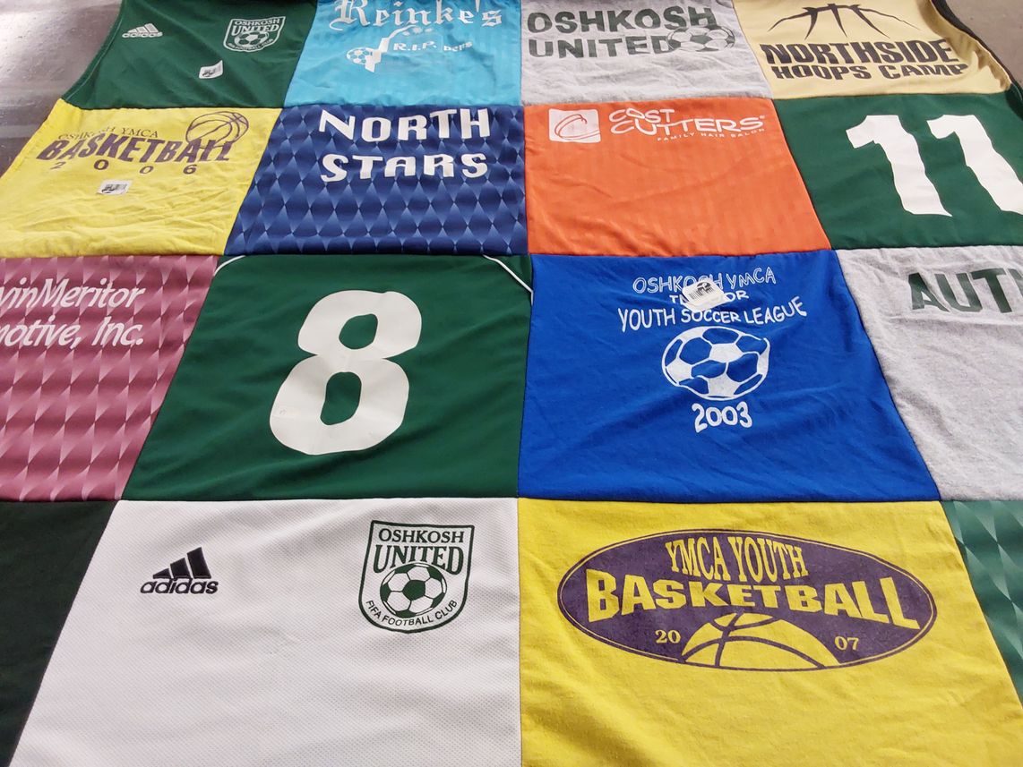 T-shirt quilt featuring oshkosh united, north stars by Christine from WI