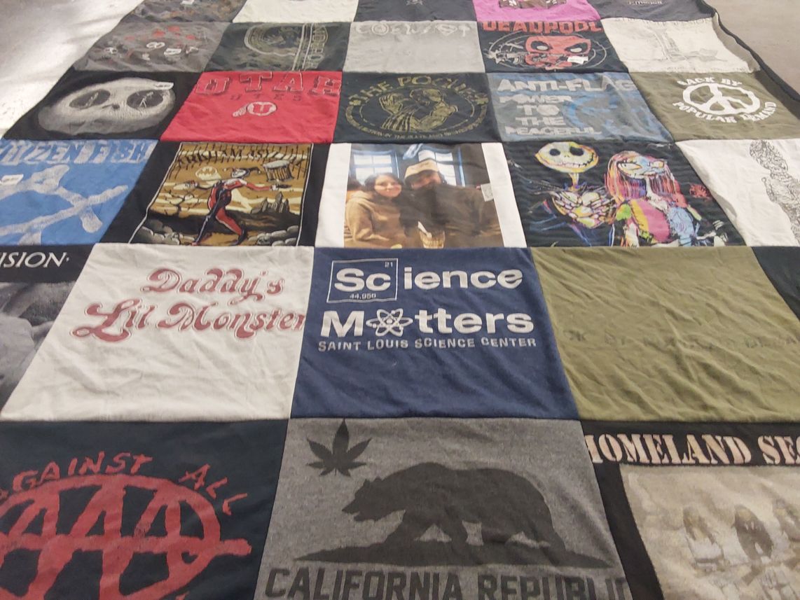T-shirt quilt with comics, science themes by Sharolyn from UT