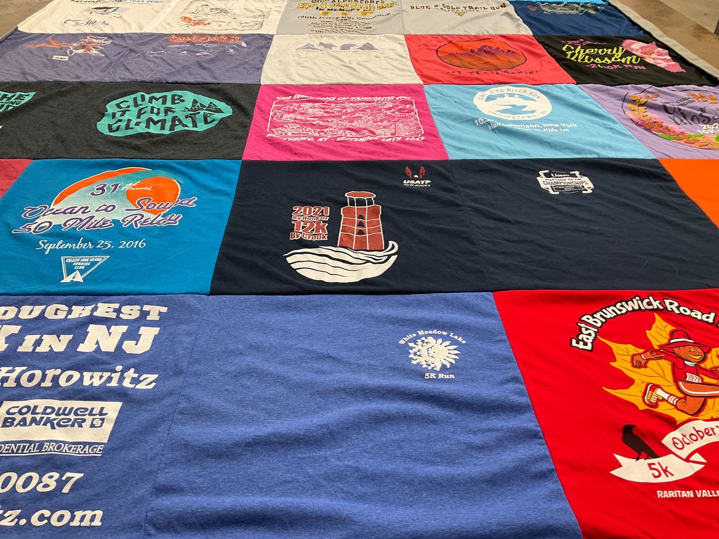 T-shirt quilt with running, events themes by Sandra  from NJ