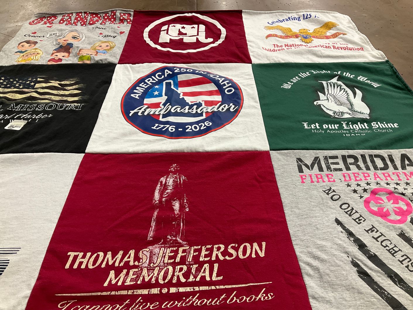 T-shirt quilt with history, community service themes by Louise from ID