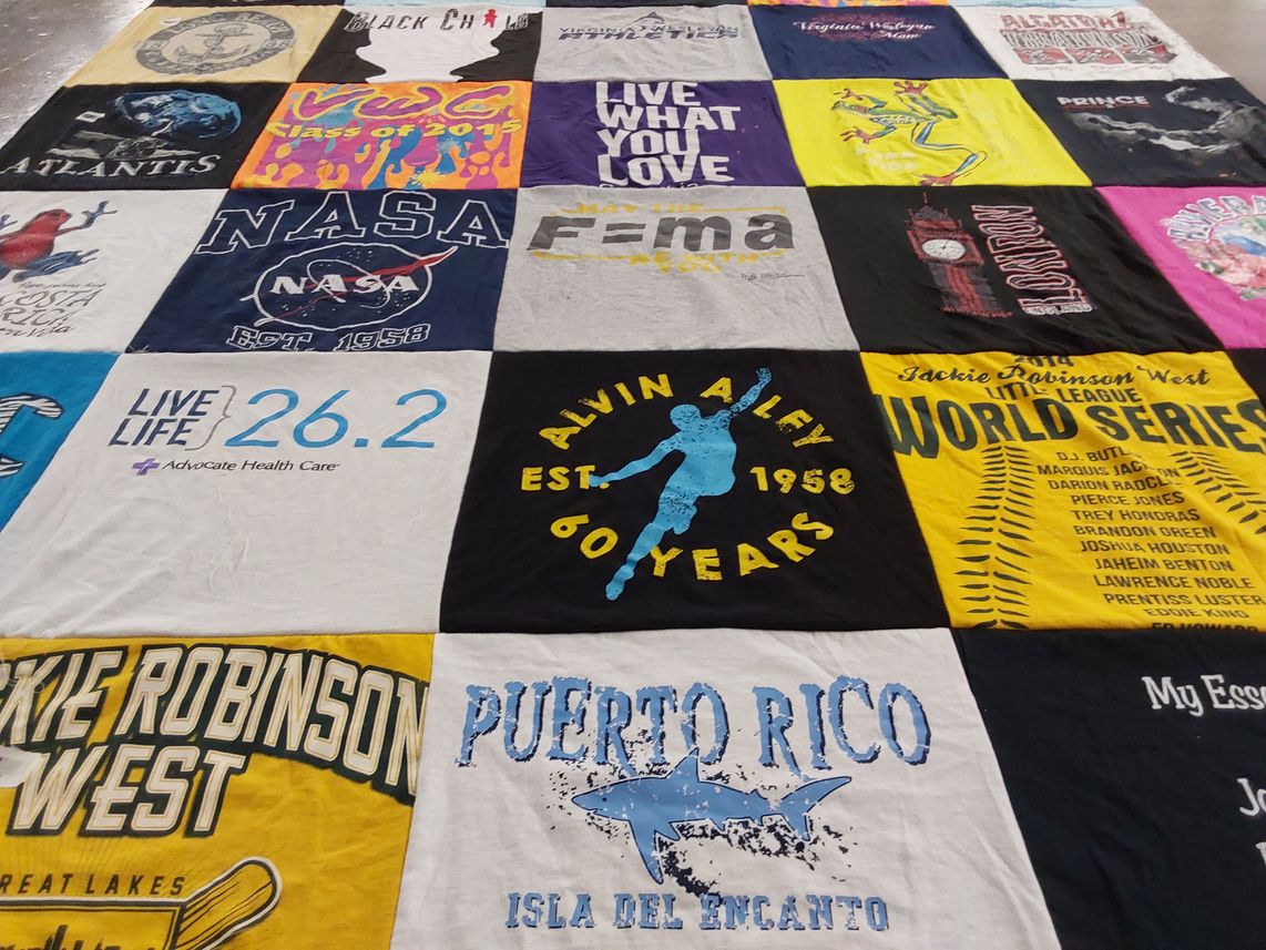 T-shirt quilt with space, running themes by Janet from IL