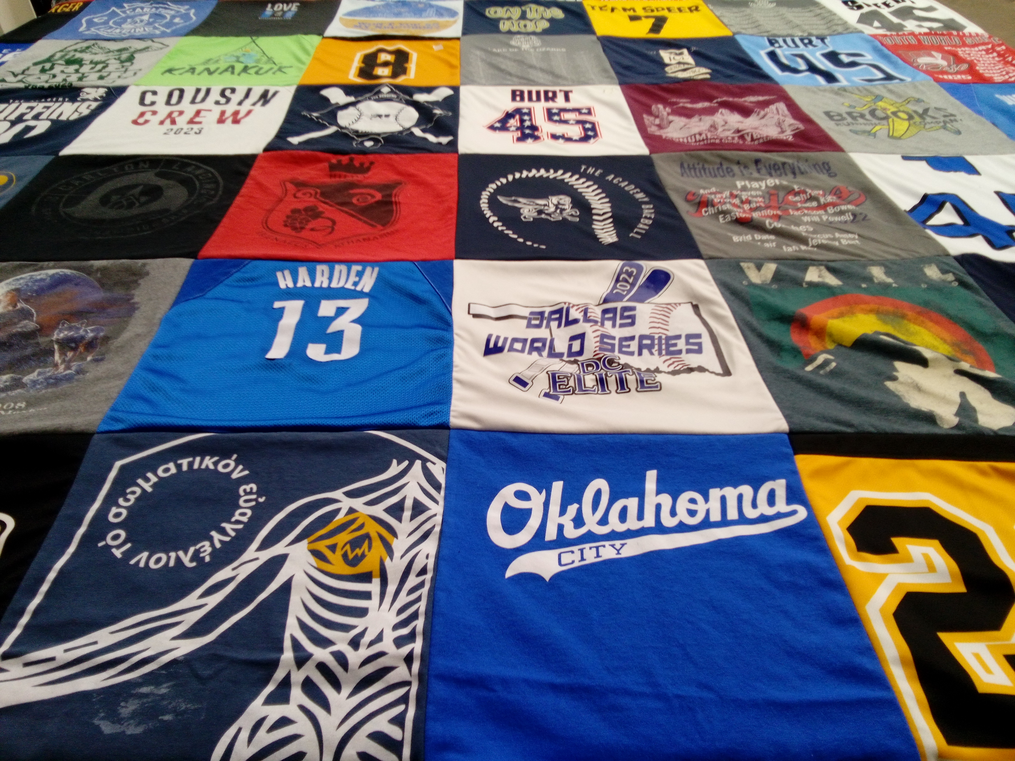 T-shirt quilt with basketball, baseball themes by Rebecca from OK