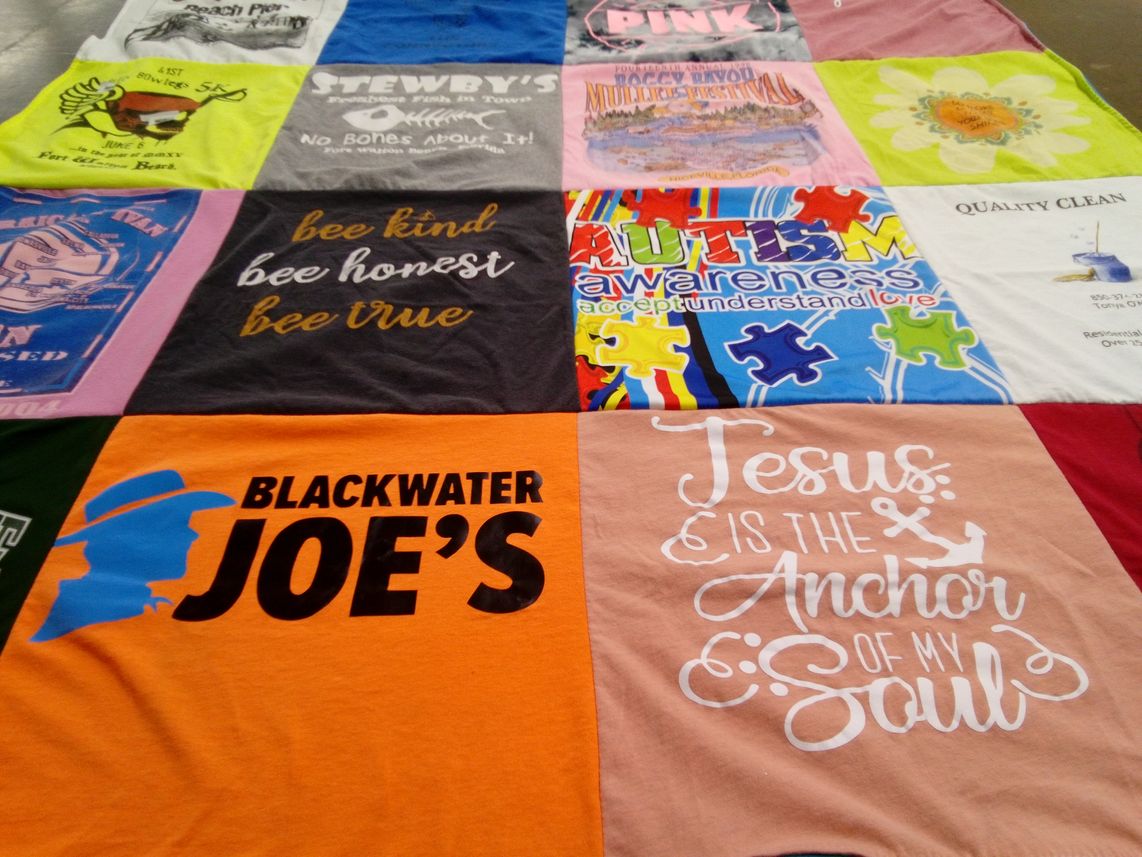 T-shirt quilt with autism awareness, community events themes by Sonja from FL
