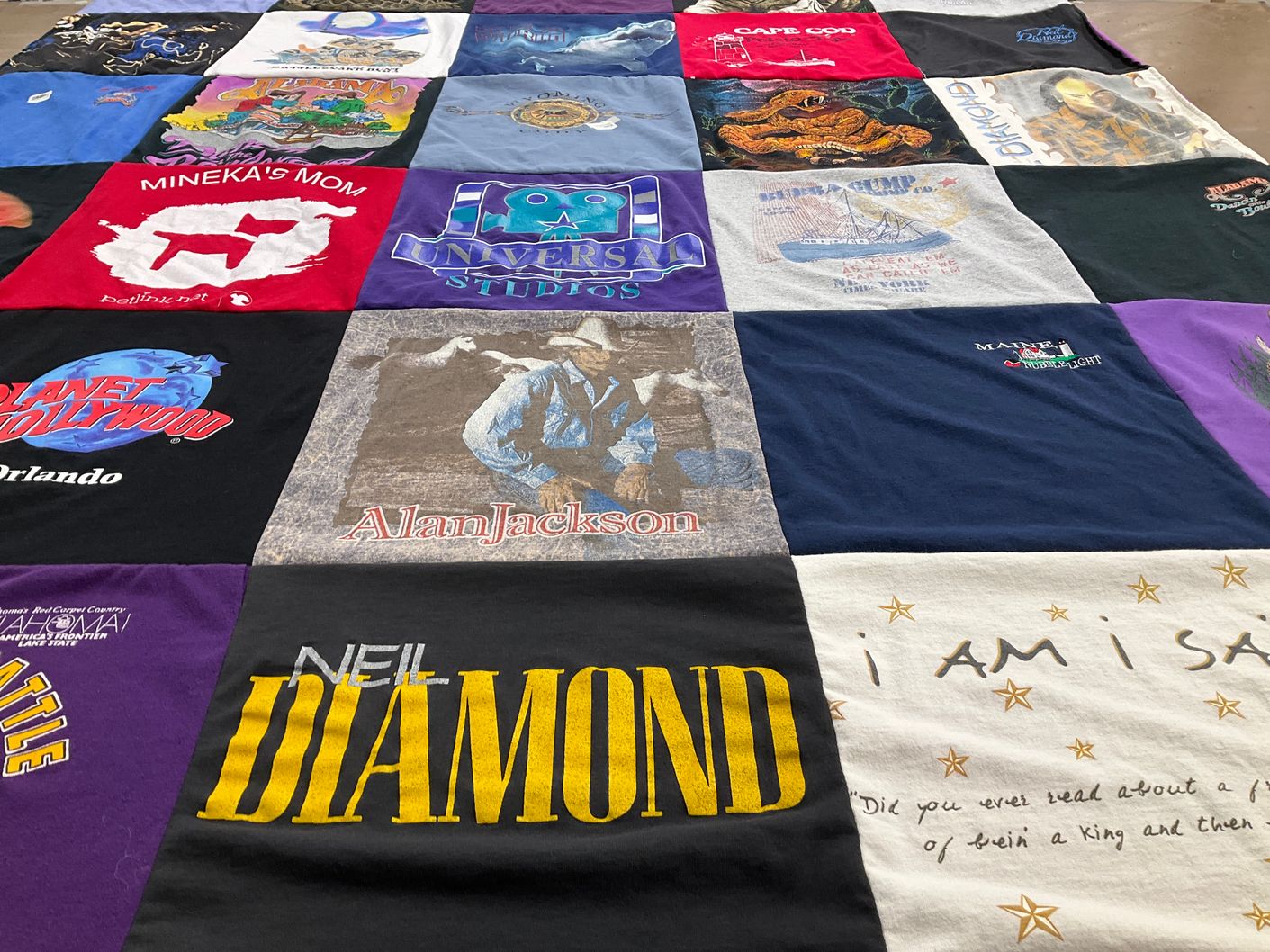 T-shirt quilt with music, travel themes by Kathy from MO
