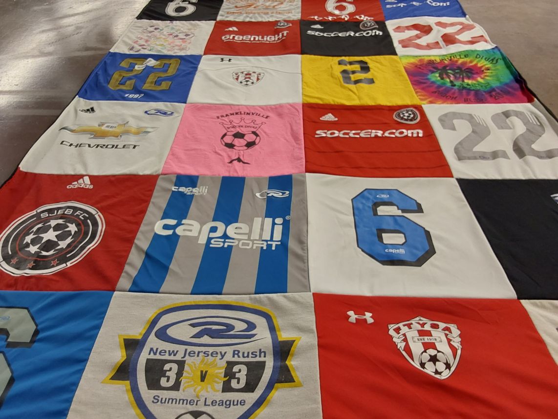 T-shirt quilt with soccer, sports themes by Teri from NJ