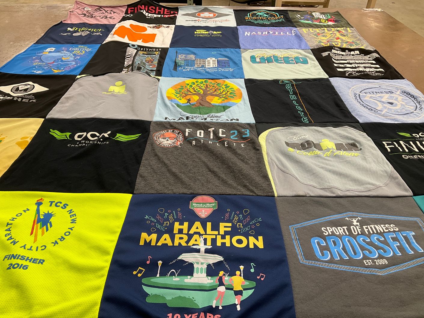 T-shirt quilt with fitness, athletics themes by Ann from SC