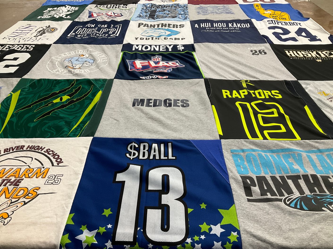 T-shirt quilt featuring bonney lake panthers, raptors by Jana from WA