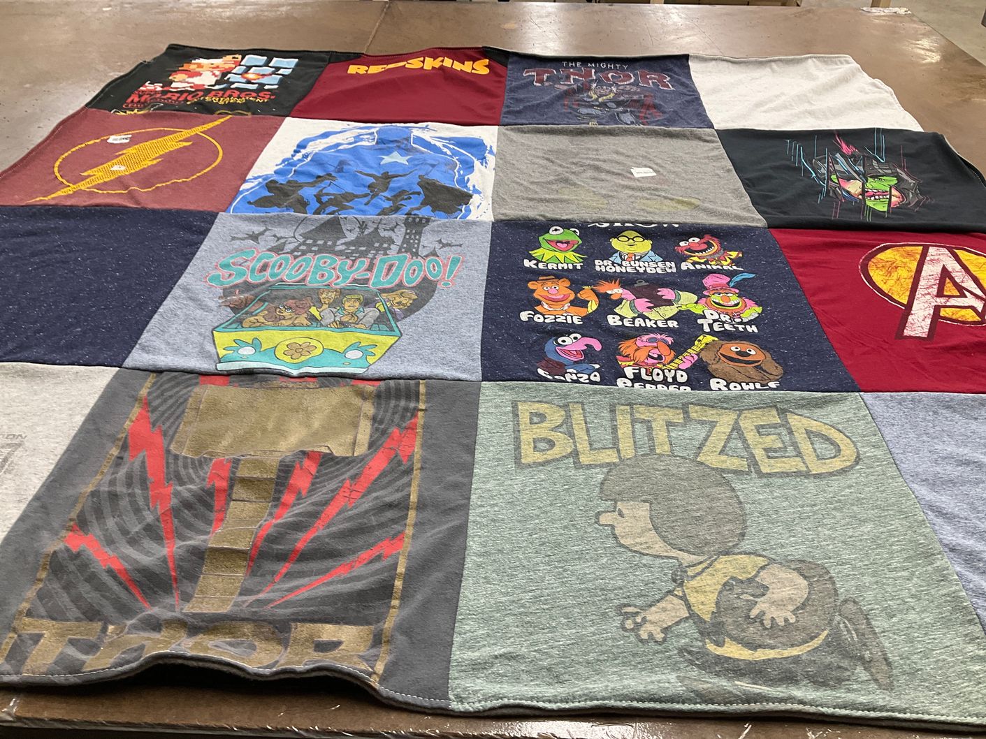 T-shirt quilt with comics, animation themes by Pam from VA