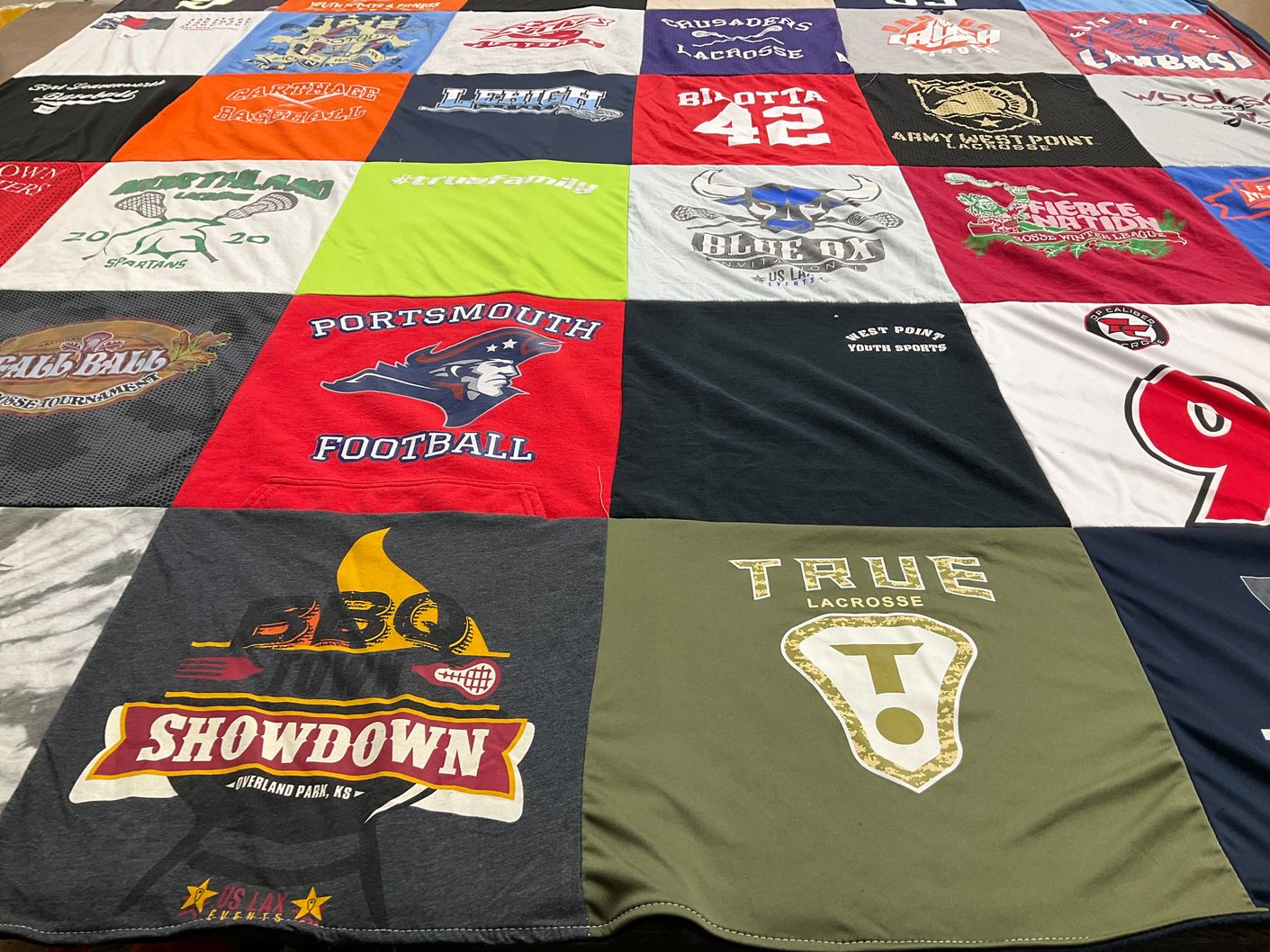 T-shirt quilt featuring army west point lacrosse, portsmouth football by sarah from VA