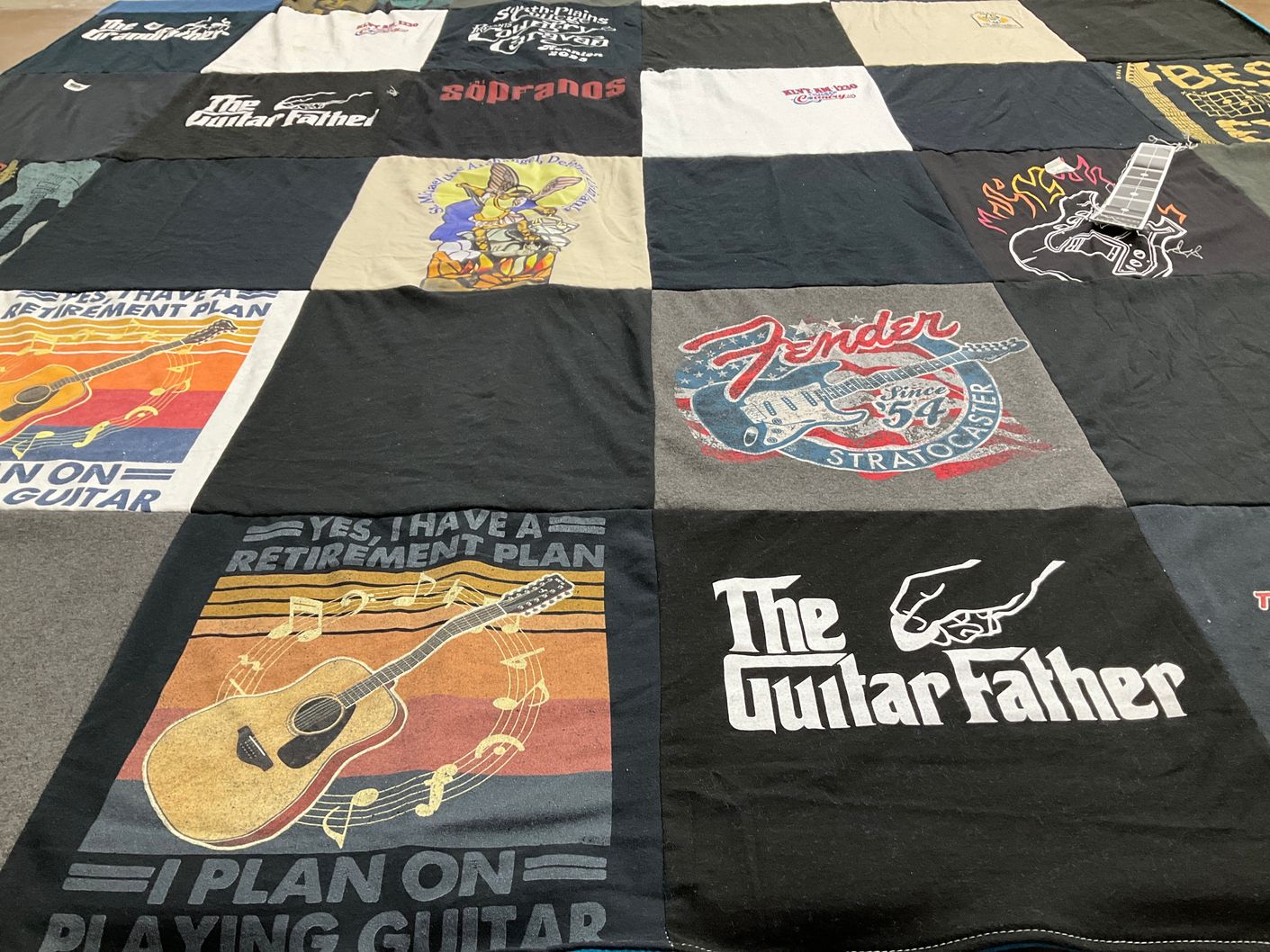T-shirt quilt with music, guitar themes by Patricia from TX
